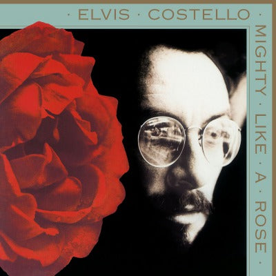 Elvis Costello Mighty Like A Rose (Limited Edition, 180 Gram Vinyl, Colored Vinyl, Gold) [Import]